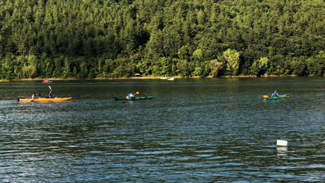 Clip-of-some-kayaks-while-sailing-in-the-Pancharevo-lake,-Bulgaria