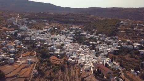 Aerial-Drone-Shot-Coming-in-from-the-Backside-of-the-Agricultural-Village-of-Lefkes-Greece