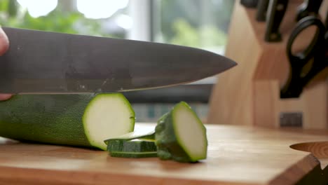 Slow-motion-shot-slicing-a-courgette