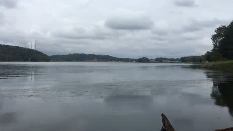 Time-Lapse-video-of-a-scenic-lake-on-a-cloudy-rainy-gloomy-day