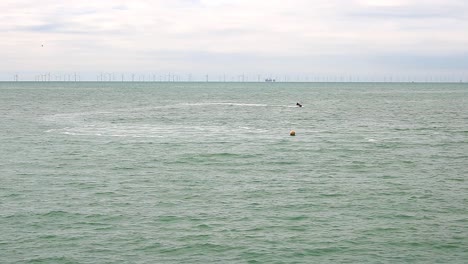 Background-shot-of-the-offshore-wind-generator-farm-at-Brighton-in-the-UK