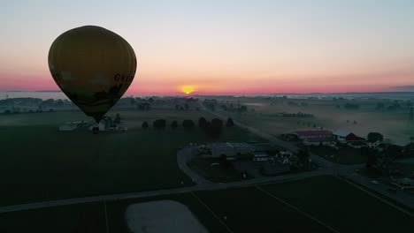 Hot-Air-Balloons-Taking-off-on-a-Foggy-Autumn-Morning