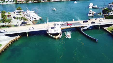 Cool-overhead-shot-of-boats-passing-under-draw-bridge