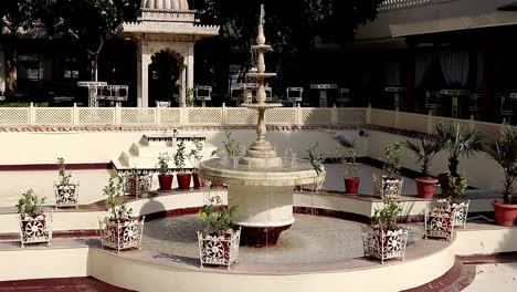 Indian-style-water-fountain-where-pigeons-having-a-bath