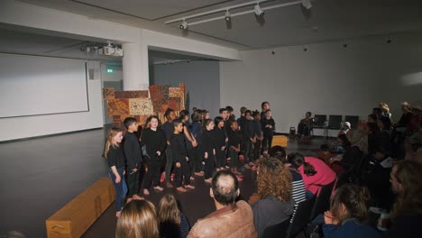 Children-singing-in-a-performance-for-their-parents
