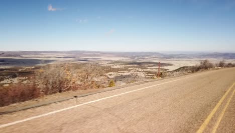 A-drive-down-a-windy-mountain-road-with-amazing-views-in-New-Mexico