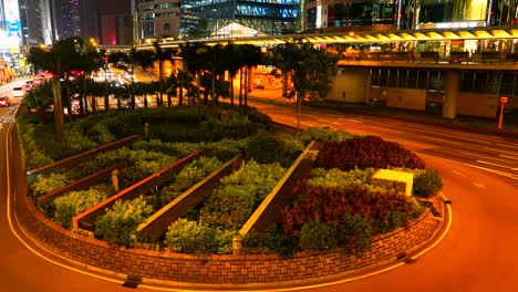 Circa---Night-time-lapse-of-busy-traffic-at-a-junction-and-roundabout-in-Hong-Kong-city