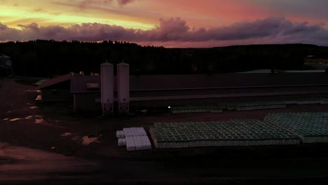 red-color-poultry-farm-in-Finland-at-very-beautiful-sunset