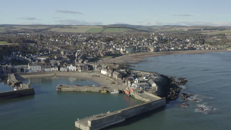 An-aerial-view-of-Stonehaven-town-and-harbour-on-a-sunny-day,-Aberdeenshire,-Scotland