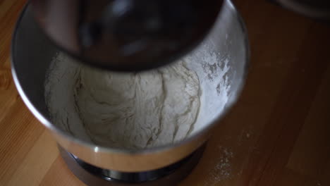 Stand-mixer-preparing-dough-for-pizza,-croissants-or-bread