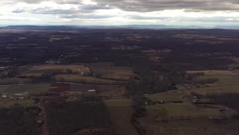 Drone-settles-over-a-valley-of-farms-in-the-Catskill-Mountains-region