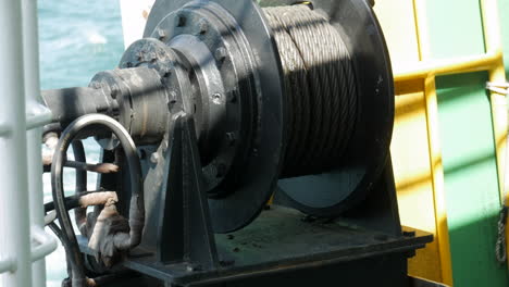 Black-pulley-system-located-on-a-ferry