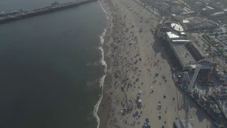 AERIAL---People-on-the-Beach-next-to-Beach-Boardwalk