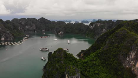 Closing-in-overview-clip-of-cruise-ships-in-Halong-Bay-Vietnam