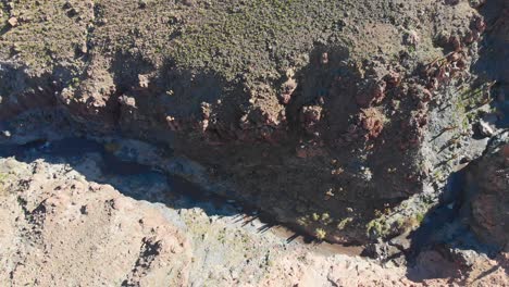 Aerial-top-view-of-popular-giant-cactus-canyon-near-San-Pedro-de-Atacama-in-the-Atacama-Desert,-northern-Chile,-South-America