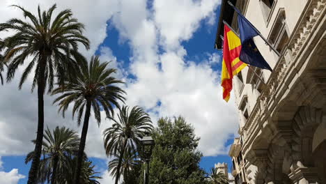 Flags-of-Europe,-Spain-and-the-Balearic-islands-waving