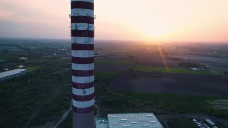 Aerial-view,-drone-flight-upwards-the-idle-chimney