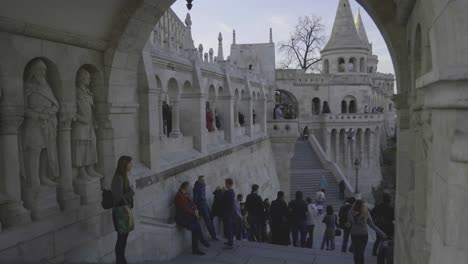 Buda-Castle-Fisherman's-Bastion-Slow-motion-shot-with-turists-passing-by