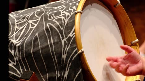 close-up-big-Pacific-Island-drums-being-play-using-just-the-fingers-at-the-cultural-festival-in-Auckland