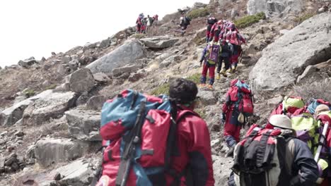 NIM-Trainees-on-their-way-to-trail,-passing-through-Himalayan-Hills