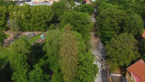 Aerial-footage-showing-construction-of-a-the-road-delsjovagen-in-Gothenburg,-Sweden