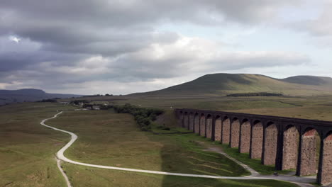Aerial-Shot-Pushing-In-on-Ribblehead-Viaduct---Train-Station-in-the-Yorkshire-Dales-National-Park
