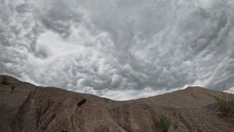 Ominous-rolling-storm-clouds-motion-time-lapse-over-quarry-in-central-Kentucky-2-of-3