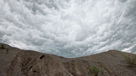 Ominous-rolling-storm-clouds-motion-time-lapse-over-quarry-in-central-Kentucky-3-of-3
