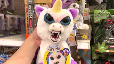 Feisty-Pets-Glenda-Glitterpoop-the-Unicorn-turns-from-cute-and-adorable-to-mean-and-feisty-when-you-squeeze-the-back-of-her-neck