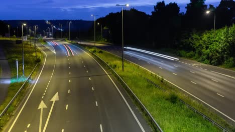 Busy-time-lapse-traffic-at-night-on-a-dual-carriageway-United-Kingdom