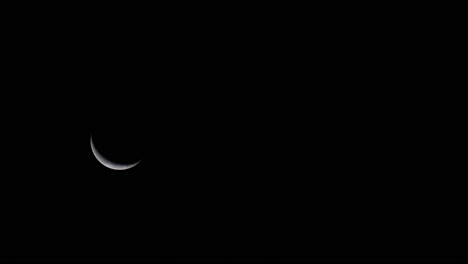 Telephoto-Shot-of-Moon-crescent-rising-at-night-timelapse