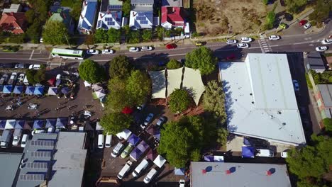 Panning-aerial-view-over-the-Farfield-Farmers-Market,-March-2017