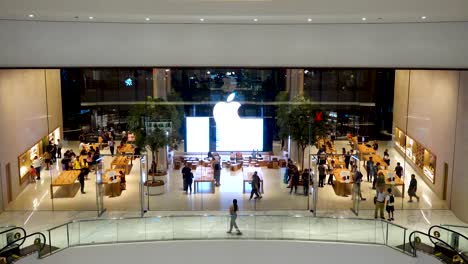 Bangkok,-Thailand---July-30,-2019:-A-lot-of-people-visiting-the-first-official-Apple-store-in-Thailand,-opening-in-the-IconSiam-shopping-mall-located-by-Chao-Phraya-River-in-Bangkok
