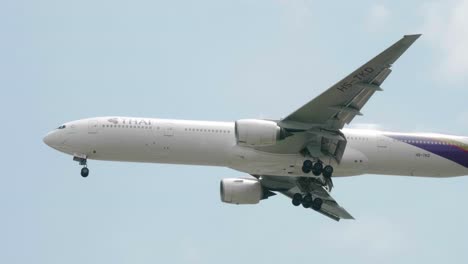 Thai-Airways-Boeing-777-3D7-HS-TKD-approaching-before-landing-to-Suvarnabhumi-airport-in-Bangkok-at-Thailand