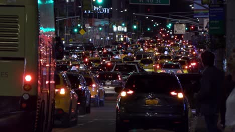 Busy-summer-night-time-traffic-in-New-York-City-street