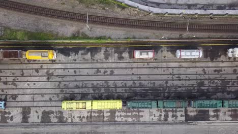 Aerial-pan-view-of-a-railway-with-differents-types-of-wagons