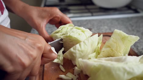 Cutting-White-Cabbage-With-A-Sharp-Knife