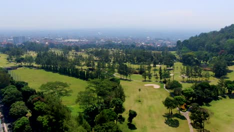 Golf-course-green-lawn-field,-Magelang-sport-facility,-Indonesia,-aerial-view