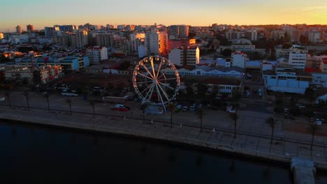 Luftaufnahme-Der-Stadt-Portimao-In-Portugal,-Malerischer-Sonnenuntergang-4k-Uhd
