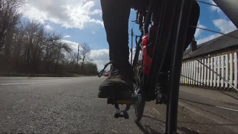 Low-Angle-POV-Looking-Back-Cycling-Being-Overtaken-By-Car