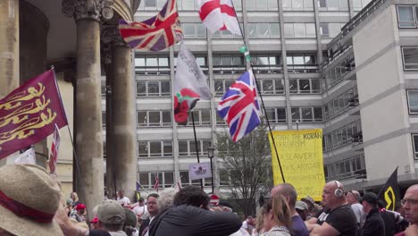 Tommy-Robinson-supporters-wave-flags-outside-the-BBC-studio-in-London