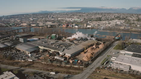 Aerial-flying-over-a-wood-processing-facility-in-Greater-Vancouver