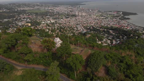 Drone-footage-of-Port-of-Spain-on-the-Caribbean-island-of-Trinidad-and-Tobago-from-a-port-in-the-mountains