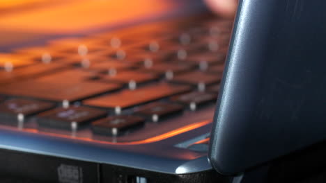 Close-shot-of-fingers-typing-on-laptop-keyboard
