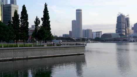 People-jog,-brisk-walk-s-at-The-Promontory,-Marina-Bay,-Singapore