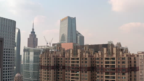 Beautiful-cinematic-view-of-Guangzhou-CDB-downtown-buildings-area-in-afternoon-on-a-bright,-cloudy-Guangdong,-China