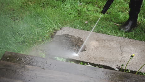 Pressure-washing-a-stone-from-dirt