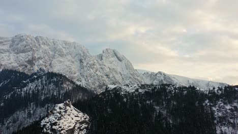Rocky-And-Icy-Mountain-Facade-Of-Tatra-Mountain-In-Poland-Europe---aerial-shot