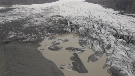 Drone-flying-over-Svinafellslon-Glacier,-Iceland