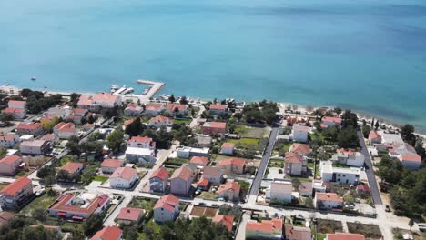 Vrsi-Mulo-near-Zadar,-Croatia-coastal-village-with-straight-streets-and-typical-houses-and-aerial-view